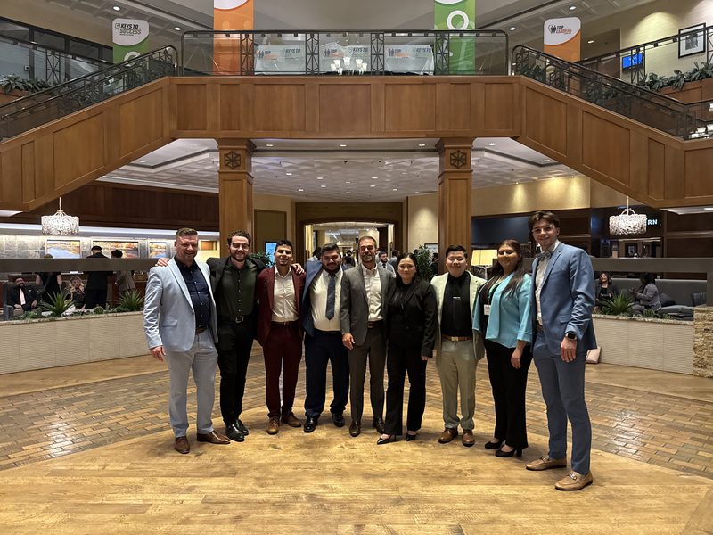 RVA Edge team members meeting in a business atrium